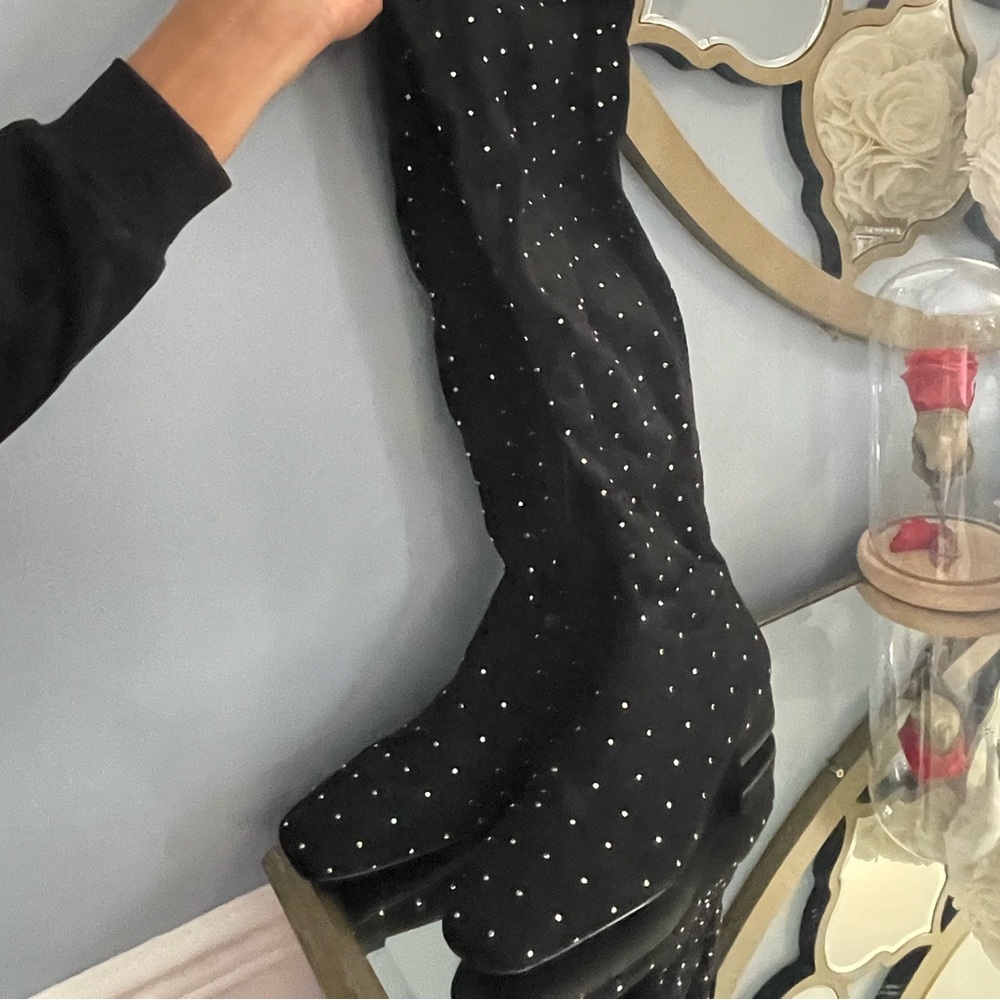 Black tall boots with metal studs